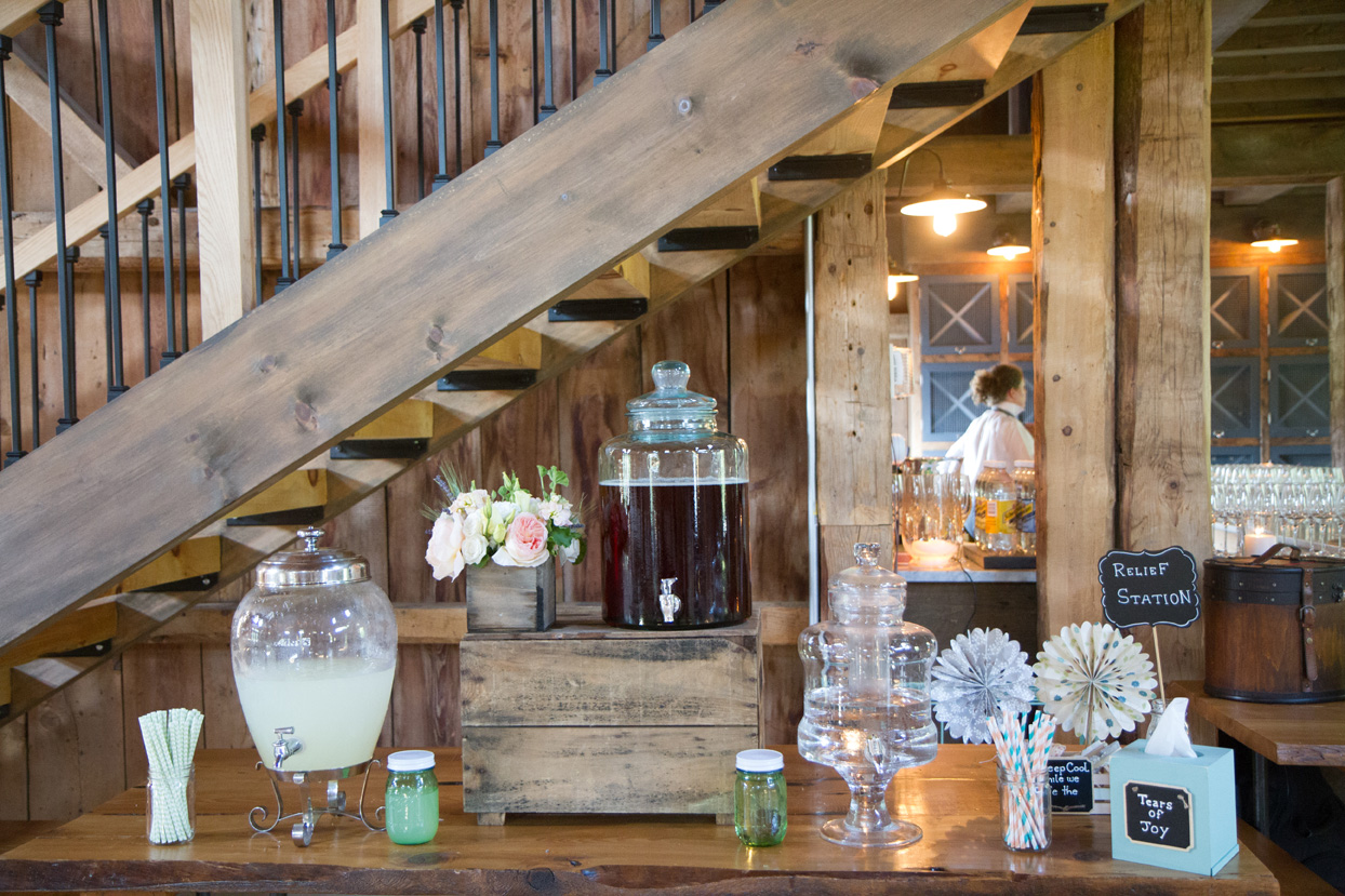 A rustic display of lemonade and tea for a Maine barn wedding. www.churchillevents.com Photo Courtesy of Kivalo Photography