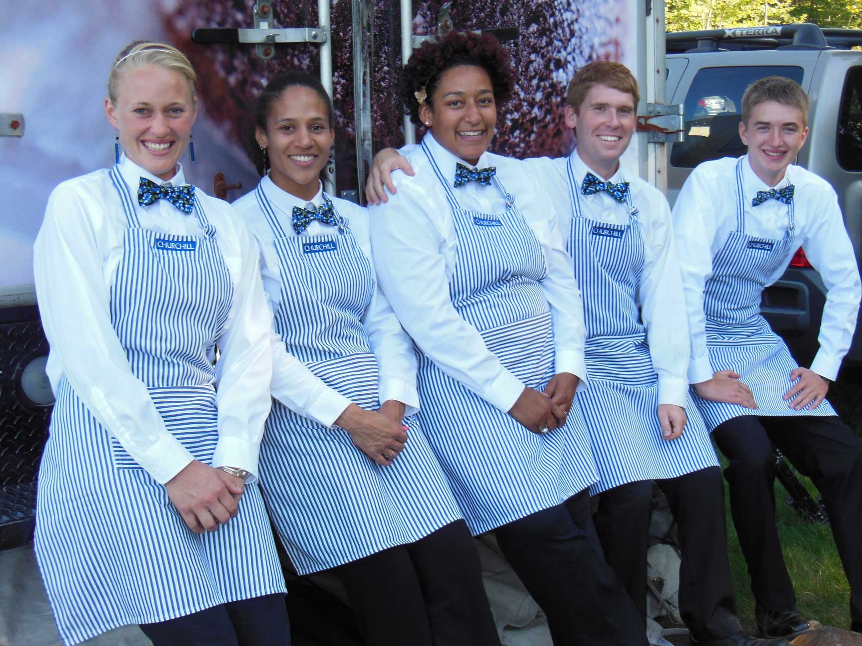 Our team of professional planners, chefs, bartenders, and servers, at beachfront wedding in Cape Elizabeth, Maine.
