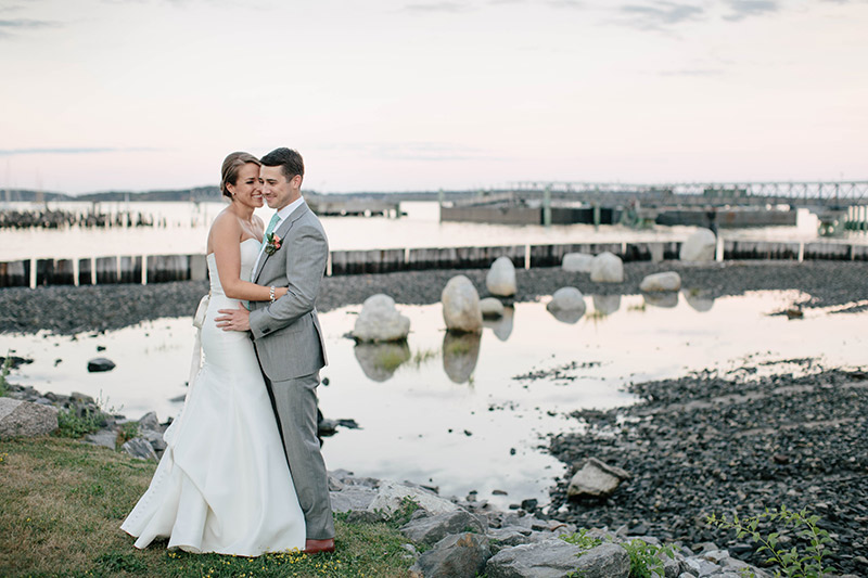 Photo of couple outside of Ocean Gateway wedding, photo courtesy of http://larakimmerer.typepad.com/lk_weblog/2016/01/karla-todd-ocean-gateway-wedding.html.